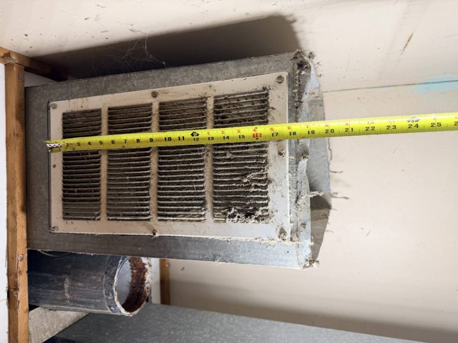 Dust buildup measured at a return grille before Cool Temp duct cleaning